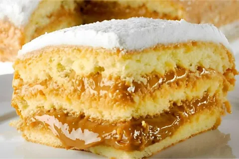 Bolo bem casado com massa macia e recheio cremoso que derret