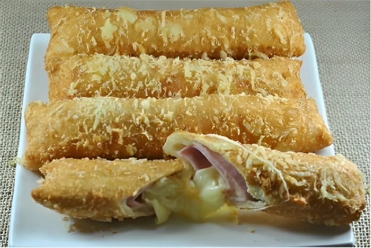 Cigarrete de presunto e queijo um lanche fácil e prático par