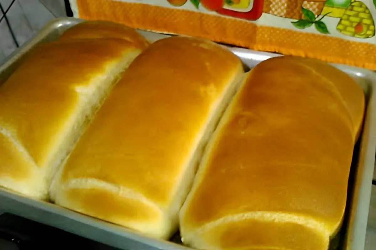 Pão caseiro muito macio e fofinho feito com ingredientes que