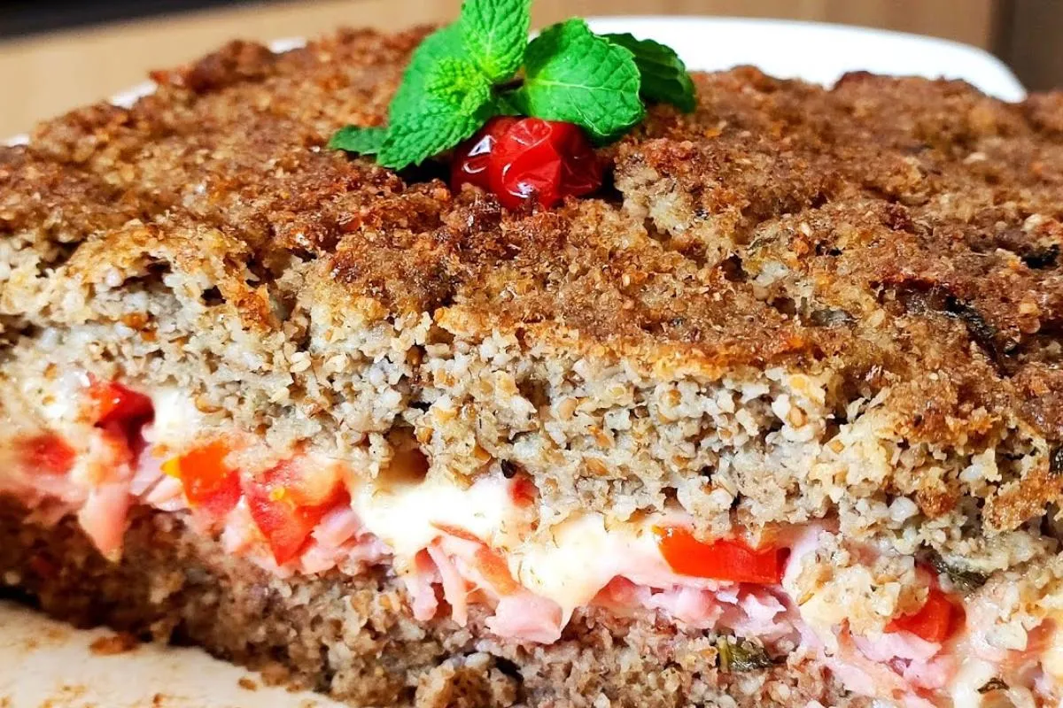 Quibe de forno recheado com queijo que fica super molhadinho