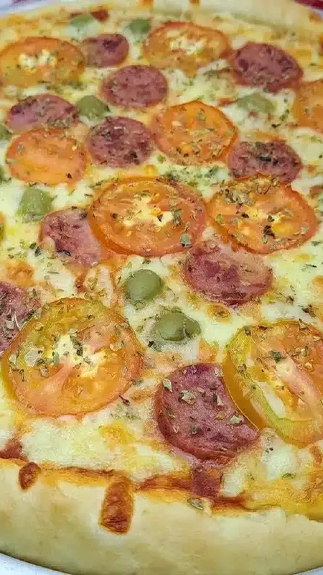 Massa de pizza caseira muito macia e que não fica ressecada quando sai do forno